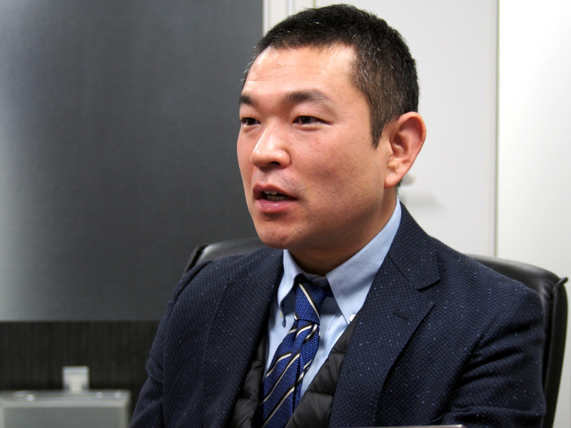 クリプトリンク取締役の酒井孝幸氏。今回は主に同社が提供するサービスの解説を担当した。